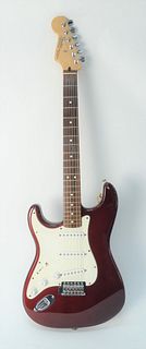 2003 Fender Left Handed Stratocaster Guitar, serial #MZ3099790, Midnight Wine Red, soft gig bag, made in Mexico, length 38 1/2 inches.