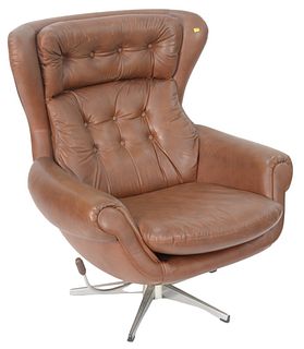 Brown Overman Lounge Chair, made in Sweden, height 37 inches, width 33 inches.