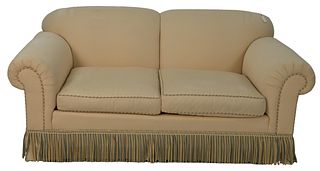 Custom Upholstered Loveseat, having two cushions with fringe, 32" x 71" x 37".