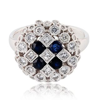 0.70ctw Diamond and 0.66ctw Blue Sapphire Platinum Ring