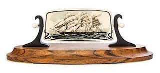 A Scrimshaw Fossil Mammoth Ivory Plaque Width overall 9 1/2 inches.