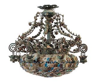 * A Wrought Iron and Glass Chandelier Height 29 inches.