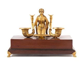 * An Empire Style Gilt Bronze Mounted Mahogany Figural Encrier Length overall 12 inches.