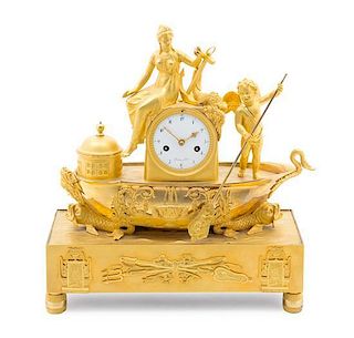 * An Empire Gilt Bronze Mantel Clock Height 14 1/2 inches.