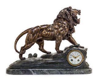 * A French Cast Metal Mantel Clock Height 17 inches.