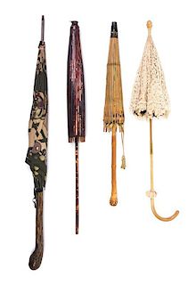 A Collection of Twenty Victorian Umbrellas and Parasols Length of longest 41 1/2 inches.