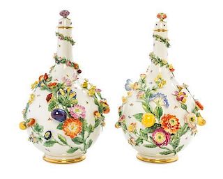 * A Pair of German Porcelain Vases and Covers Height 14 inches.