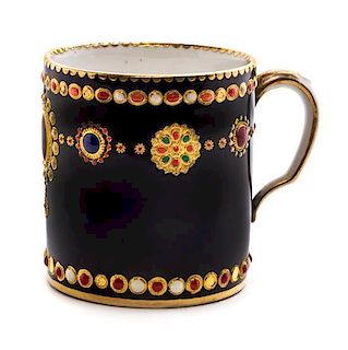 * A Sevres Jeweled Porcelain Cup Height 2 3/8 inches.