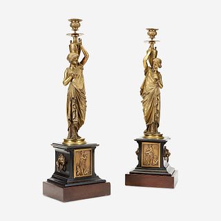 A Pair of Napoleon III Gilt-Bronze and Black Marble Figural Candlesticks, Circa 1870