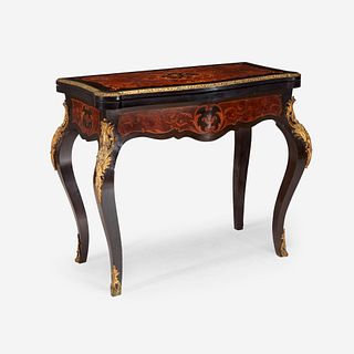 A Napoleon III Gilt-Bronze Mounted Ebonized and Marquetry Games Table, Late 19th century