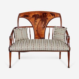 An Art Nouveau Floral Marquetry Rosewood Settee with Wisteria*, Louis Majorelle (French, 1859-1926), Nancy, circa 1900