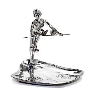 * A German Pewter Figural Visiting Card Tray Height 6 3/4 inches.