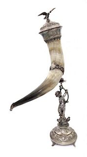 A Silver-Plate Mounted Toasting Horn Length of horn 20 1/2 inches.