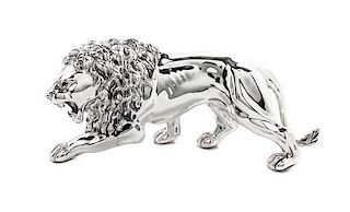 * An Italian Silver Table Ornament, 20th Century, in the form of a striding lion.