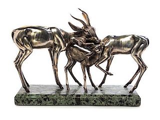 * An Italian Silver Sculpture, Sirio Tofanari, Circa 1950, depicting two gazelles with their fawn, on a marble base.