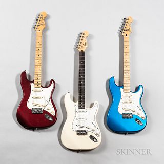 Three Squier by Fender Stratocaster Electric Guitars