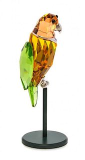 * A Swarovski Model of a Parrot Height 2 5/8 inches.