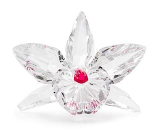 * A Swarovski Model of an Orchid Height 1 3/4 x width 2 7/8 inches.