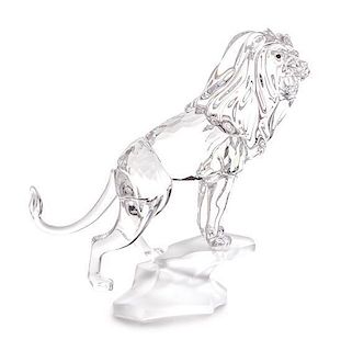* A Swarovski Model of a Lion Height 4 3/4 inches.