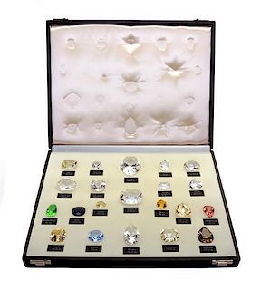 * A Collection of Replicas of Famous Diamonds Width of case 14 1/2 inches.