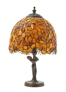 * A Continental Amber Bead Figural Lamp Height 15 1/2 inches.