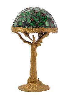 * A Leaded Ruby-in-Zoisite Table Lamp Diameter of shade 13 inches, height overall 24 inches.