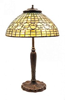 * A Tiffany Studios Leaded Glass Leaf and Vine Shade Height 25 3/4 x diameter of shade 16 inches.
