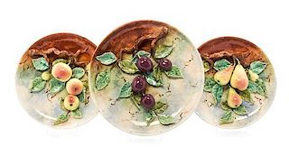 * Three French Majolica Trompe L'oeil Chargers Diameter of largest 14 1/2 inches.