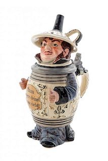 A German Pewter Mounted Character Stein Height 9 1/2 inches.