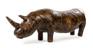 * A Leather-Clad Rhinoceros Footstool Height 24 x width 77 x depth 15 inches.