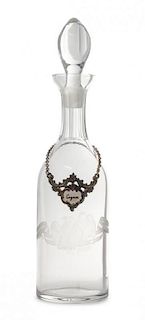 An Etched Glass Decanter Height 13 3/4 inches.
