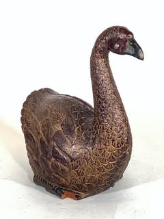 A Carved and Pigmented Wood Figure of a Swan