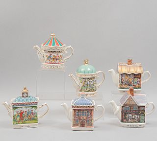 Lote de 6 teteras. Inglaterra. Siglo XX. Diferentes diseños. En porcelana Sadler. Consta de: "Carousel", "Elizabethan House", otras.