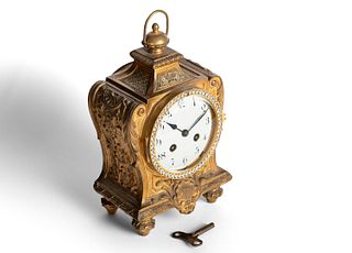 Clock in gilded bronze, 19th century, with zircons around the dial