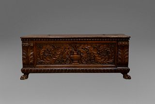 Beautiful chest in richly carved walnut, with pods, with vase on the front and lion's legs, 16th century