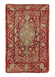 Three ancient fabrics embroidered with silk and silver threads on a red velvet background, Middle East