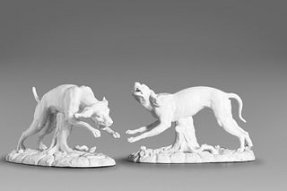 Pair of dogs in Capodimonte white porcelain, 19th century