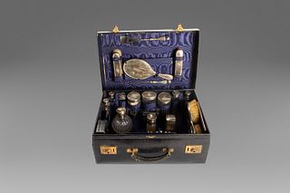 Toilet set in silver and crystal, in black leather suitcase, signed Mappin and Webb London