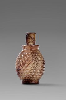 Antique glass jar with ashlar motifs on the central part