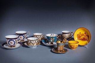 Group of eight porcelain cups with saucers, 20th century, of which two pairs