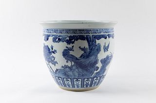 Large blue and white porcelain cachepot decorated with landscape and birds, China, 20th century