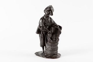 Bronze sculpture depicting a young farmer with basket, Japan Meiji period