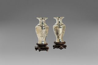 Two small silver vases with floral decorations, China, 20th century