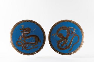 Pair of cloisonnÃ© plates with opposing dragons on a blue background, with fine gold decoration on the edge, China late 19th century - early 20th cent