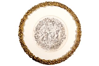 Round frame in golden metal with floral motifs