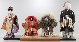 Group of Four Japanese Dolls With Stands