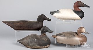 Four carved and painted duck decoys