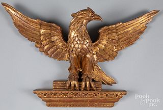 Carved giltwood eagle plaque, 20th c.