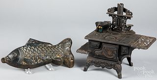 Crescent doll stove and a cast fish mold