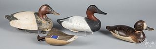 Four carved duck decoys, to include a diver.